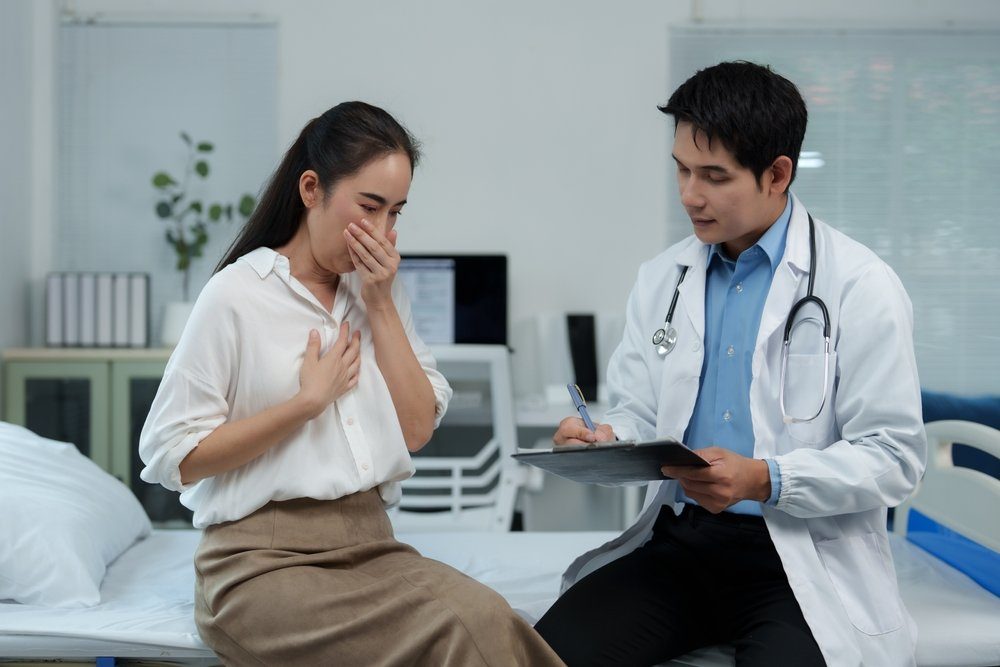 Family medicine physician examining a patient during a sick visit for acute illness in Davenport, FL